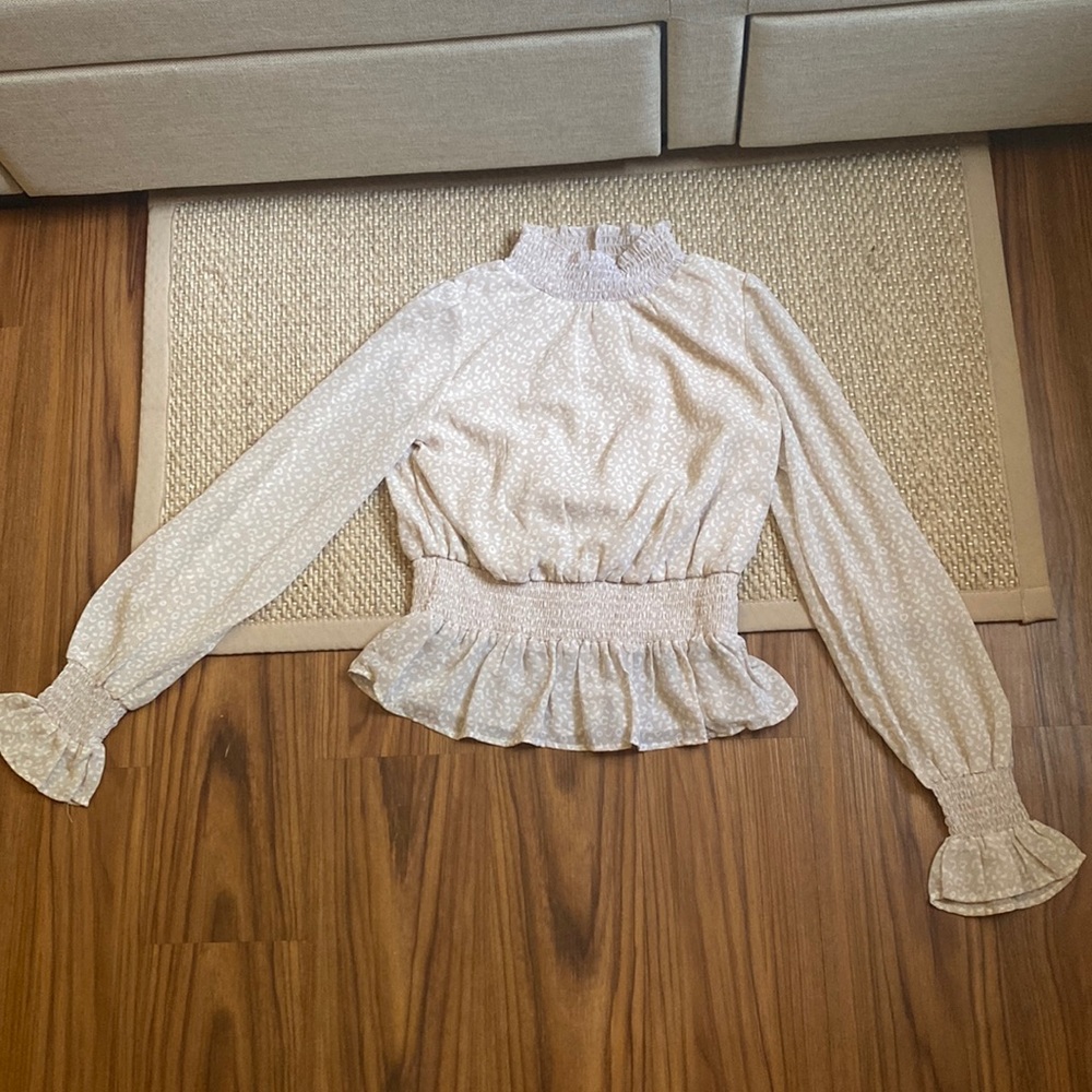Pink and white leopard print blouse